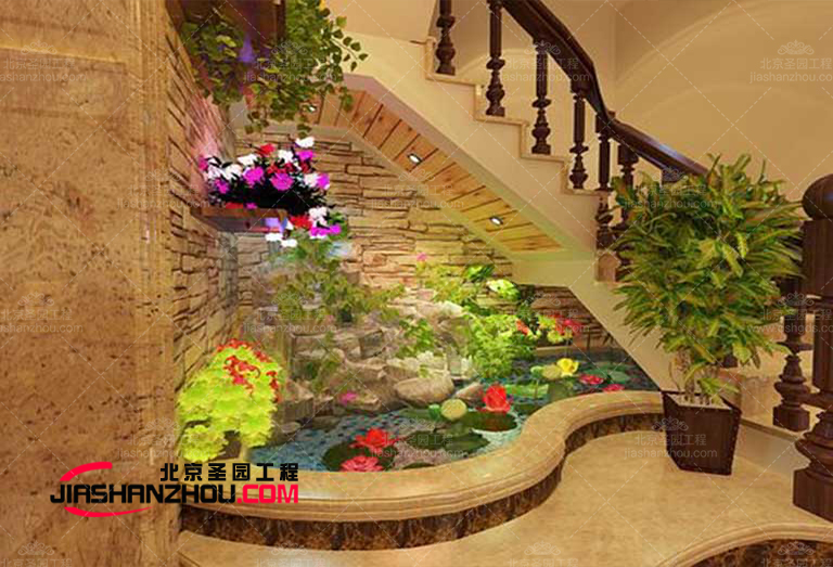 东北一家人餐厅室内水泥塑石假山景观小品制作工程施工中