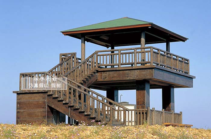 水泥仿木观光台和钢制平台相比优点是不破坏原有的景观